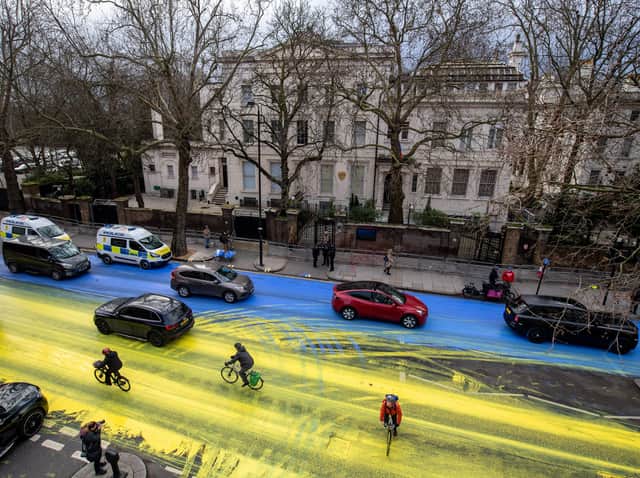 as-a-stunt,-the-anti-government-organization-leading-by-donkeys-painted-the-ukrainian-flag-on-the-street-outside-the-russian-embassy-in-london